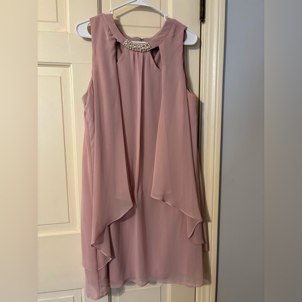 Dusty colored rose semi-formal shift dress with a high pearl collar.